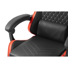Silla gamer Mars Gaming MGCXBBL negra y roja reclinable, reposabrazos ajustable, reposapiés, cojines