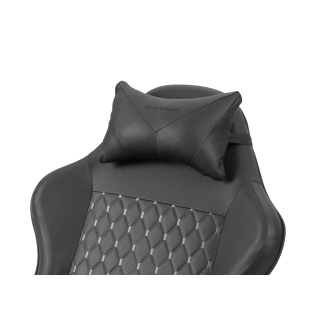 Silla gamer Mars Gaming MGCXBK negra reclinable, reposabrazos ajustable, reposapiés, cojines